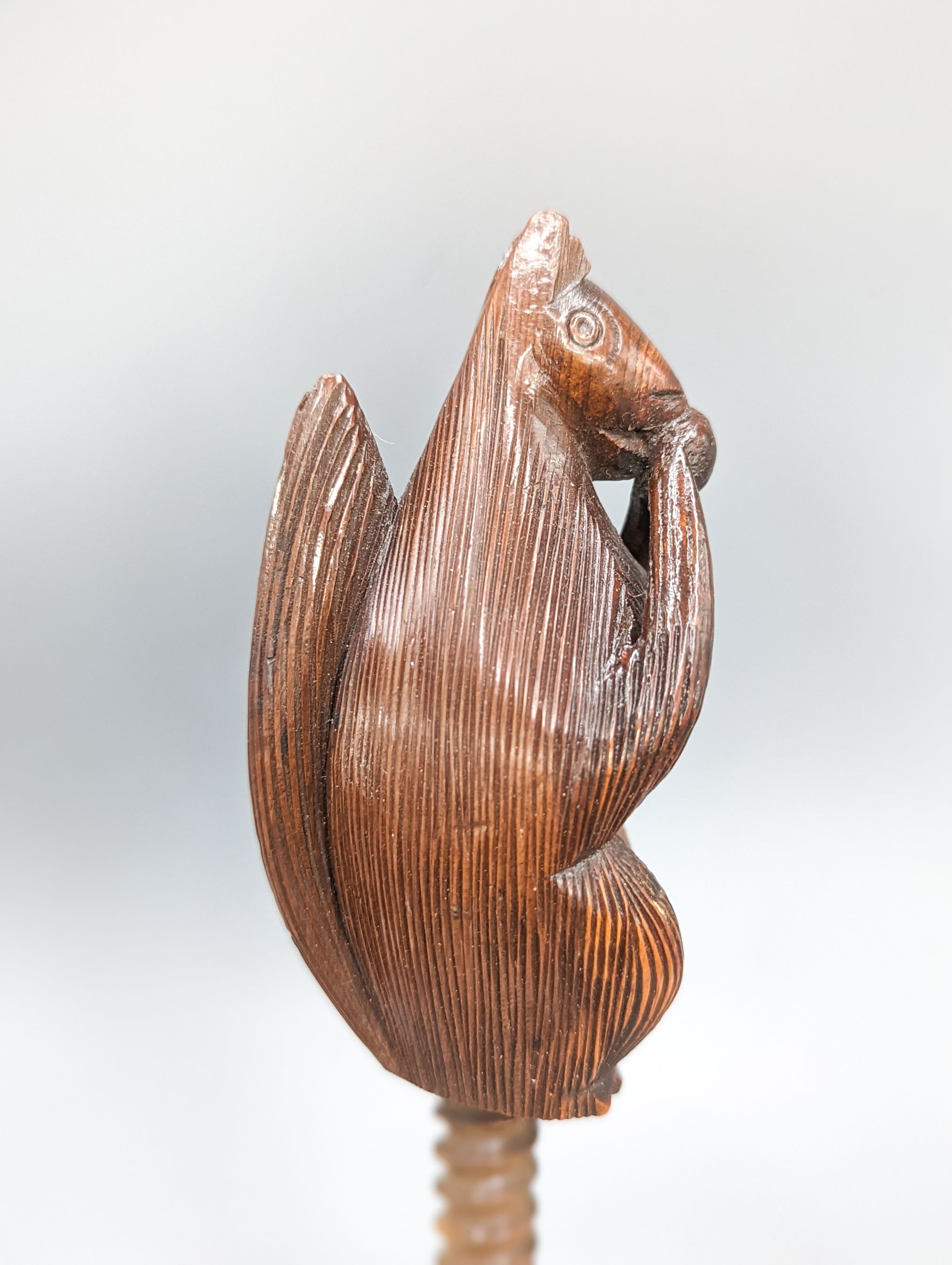 An 18th/19th century fruitwood 'squirrel' nut cracker, 16.3cm